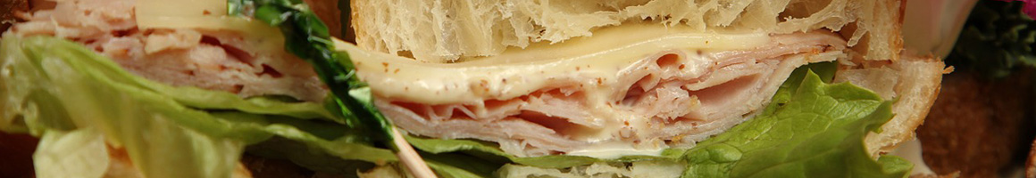 Eating Sandwich Salad at Harvey's Sandwich & Salads restaurant in Palm Harbor, FL.